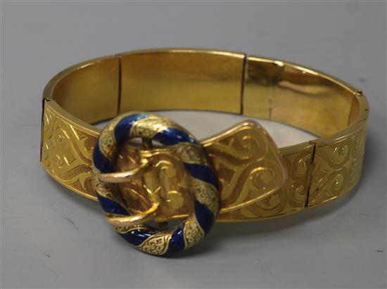 A Victorian engraved gold and blue enamel buckle bracelet (a.f),